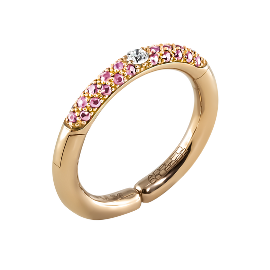 A vibrant blend of colour and brilliance, this 18ct yellow gold Populse Confetto ring features a 0.08ct brilliant round diamond at its centre, surrounded by a half eternity band of 0.33ct pink sapphires.