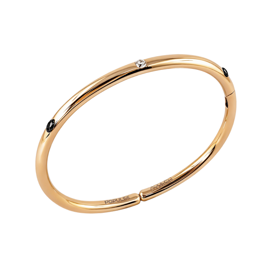 A bold expression of modern luxury, this 18ct yellow gold bangle features 0.15ct of brilliant round diamonds, complemented by 0.26ct of black diamonds for a striking contrast.