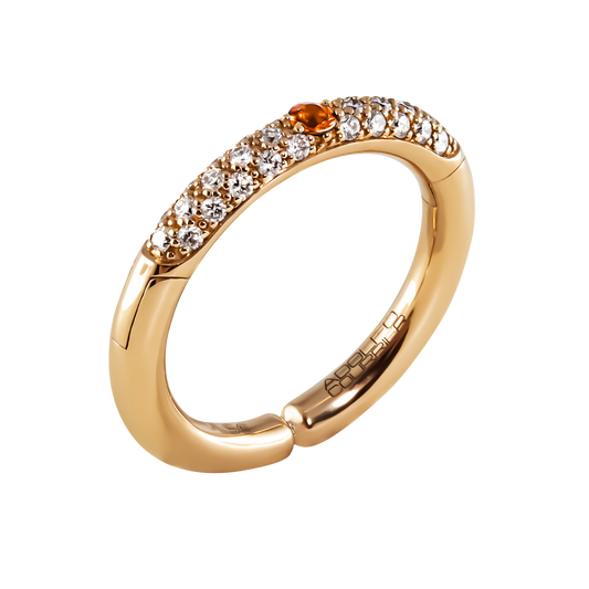Crafted in 18ct yellow gold, this Populse Hermès half eternity ring features 0.29ct of brilliant round diamonds, centred by a vibrant 0.07ct orange sapphire.