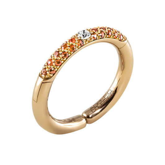 Crafted in 18ct yellow gold, this Populse Hermès ring features a 0.08ct brilliant round diamond at its centre, framed by a half eternity band of 0.37ct orange sapphires.