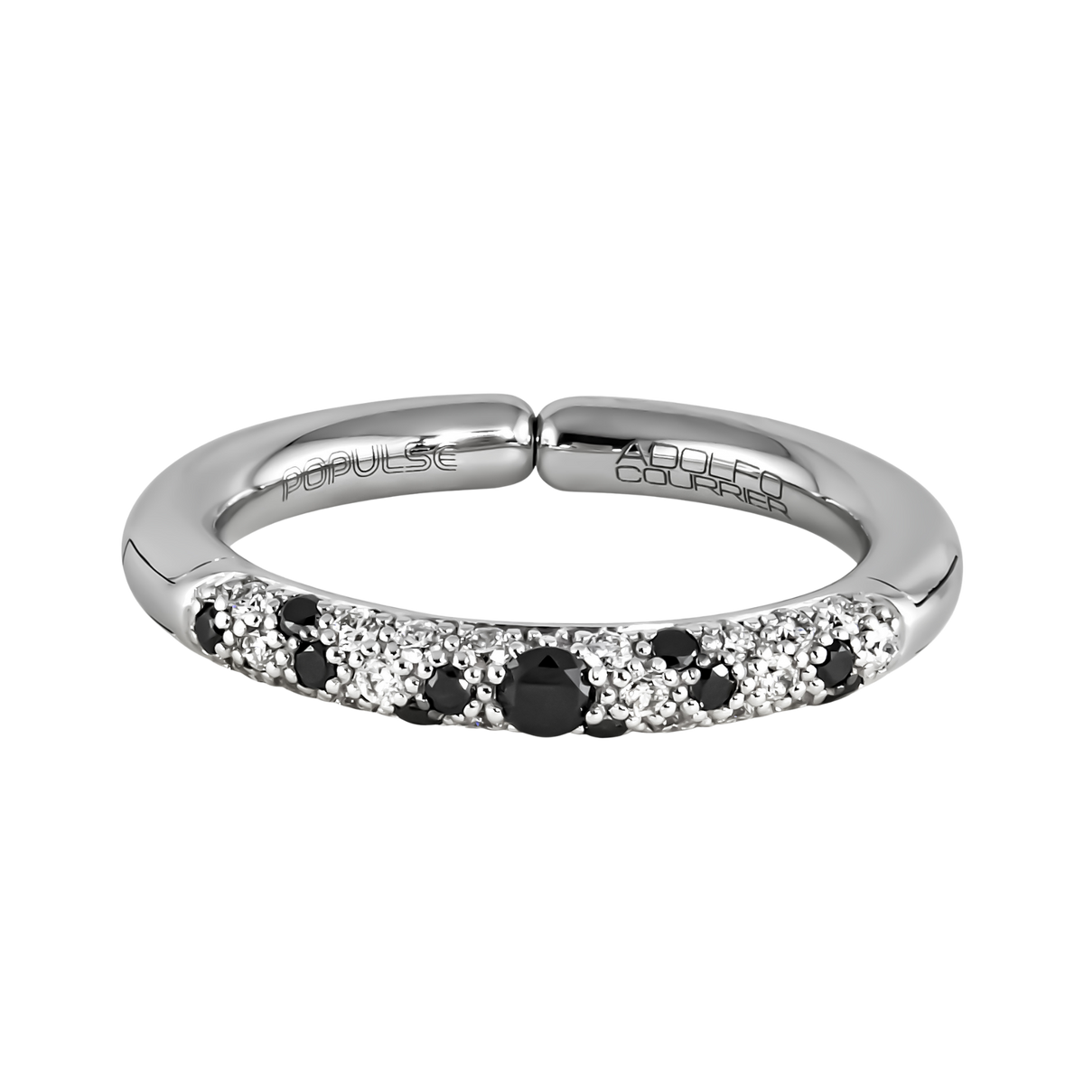 From the Populse Jungle Black & White Collection, this 18ct white gold design combines a central black diamond with an artfully dispersed arrangement of white and black diamonds, creating a contemporary half eternity style.