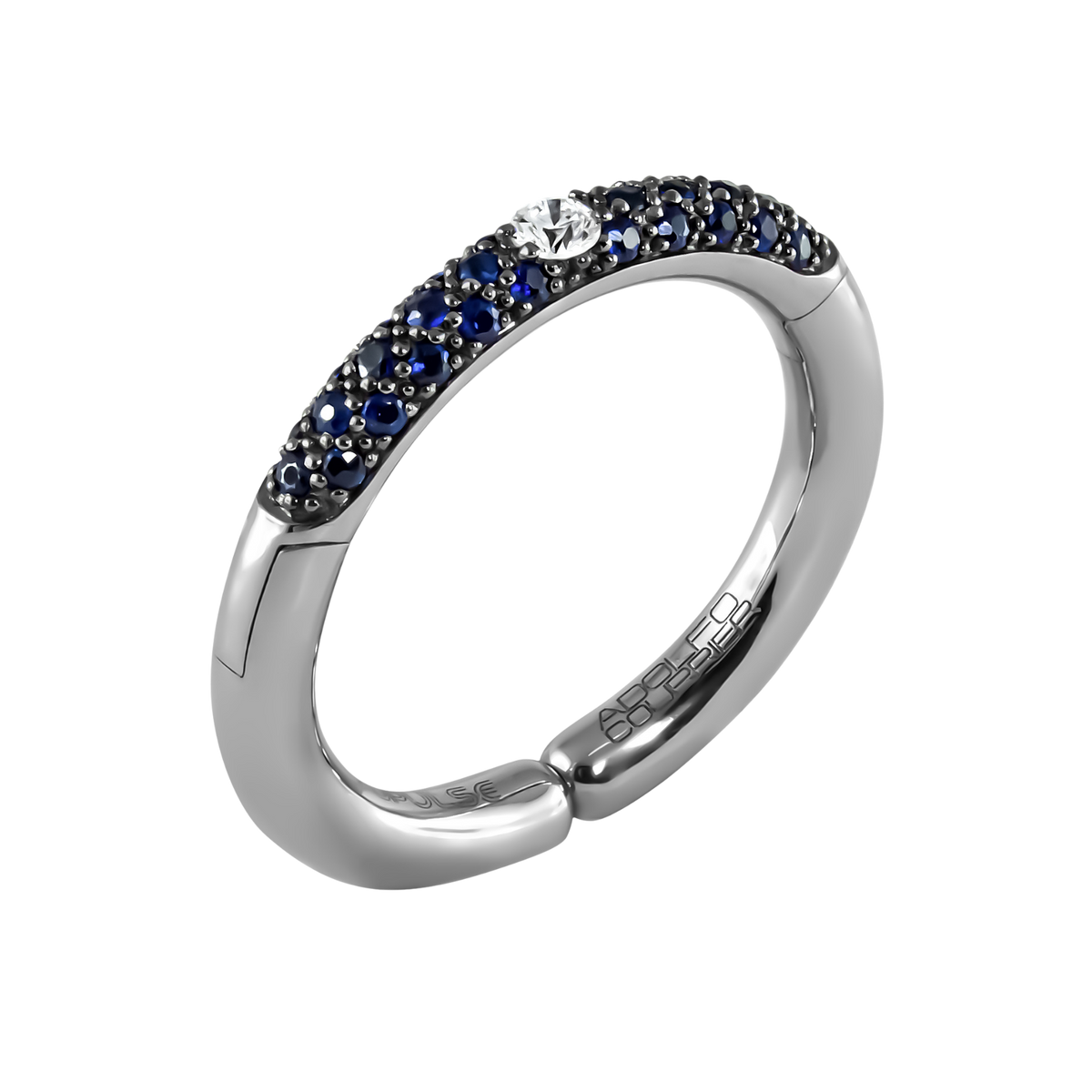 A striking blend of colour and brilliance, this 18ct white gold Populse Jeans ring features a 0.09ct brilliant round diamond, framed by a flowing half eternity of vivid blue sapphires for a bold yet elegant finish.