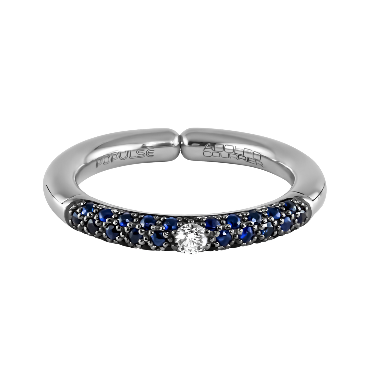 From the Populse Jeans Collection, this contemporary design pairs a radiant centre diamond with 0.32ct of blue sapphires, bringing vibrant contrast and effortless sophistication to polished white gold.
