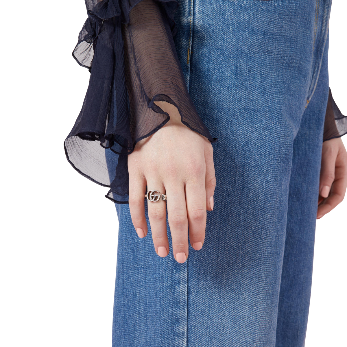 A classic Gucci sterling silver ring featuring the signature GG Marmont logo and open band design. Simple, stylish and easy to stack.