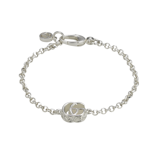 A timeless sterling silver bracelet that celebrates Gucci's unmistakable style, finished with the iconic GG Marmont emblem for a refined designer look.