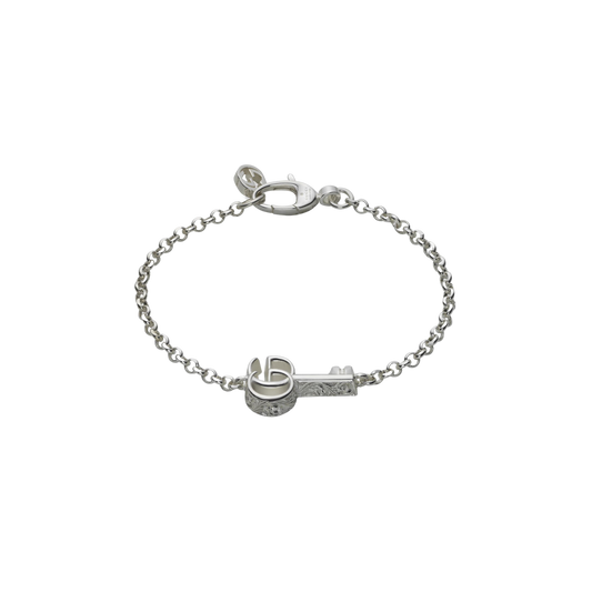 Sophisticated and effortlessly stylish, this Gucci sterling silver bracelet features an intricate key-inspired design with signature detailing. A modern luxury accessory crafted for those who appreciate timeless designer jewellery.