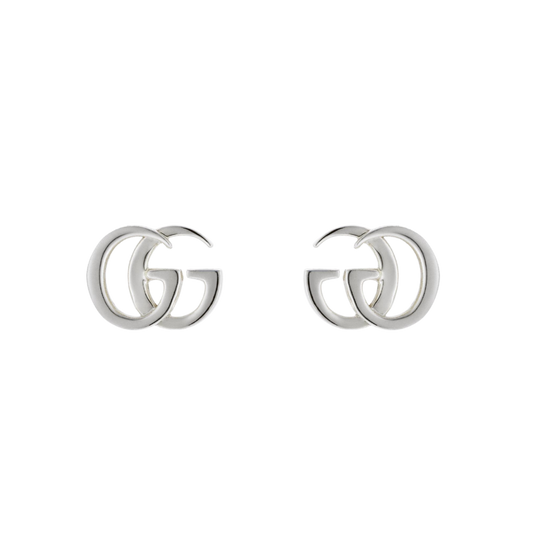 Timeless and effortlessly elegant, these Gucci silver GG earrings feature the iconic double G logo in a sleek minimalist design. 