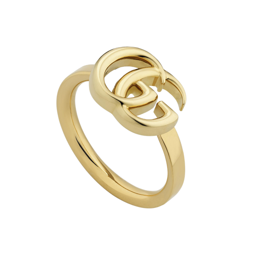 Elegant and instantly recognisable, this Gucci gold-tone GG ring features the iconic double G logo in a sleek contemporary design. A timeless statement piece that brings effortless luxury to everyday styling.