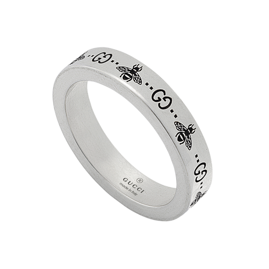 Showcasing Gucci's iconic GG and bee motifs, this size 11 sterling silver band ring offers a refined everyday look with unmistakable designer character.