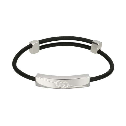 The Gucci Interlocking GG Sterling Silver Leather Bracelet is the perfect piece for elevating the everyday look with its combination of understated timeless style and luxury polished sterling silver detailing. 