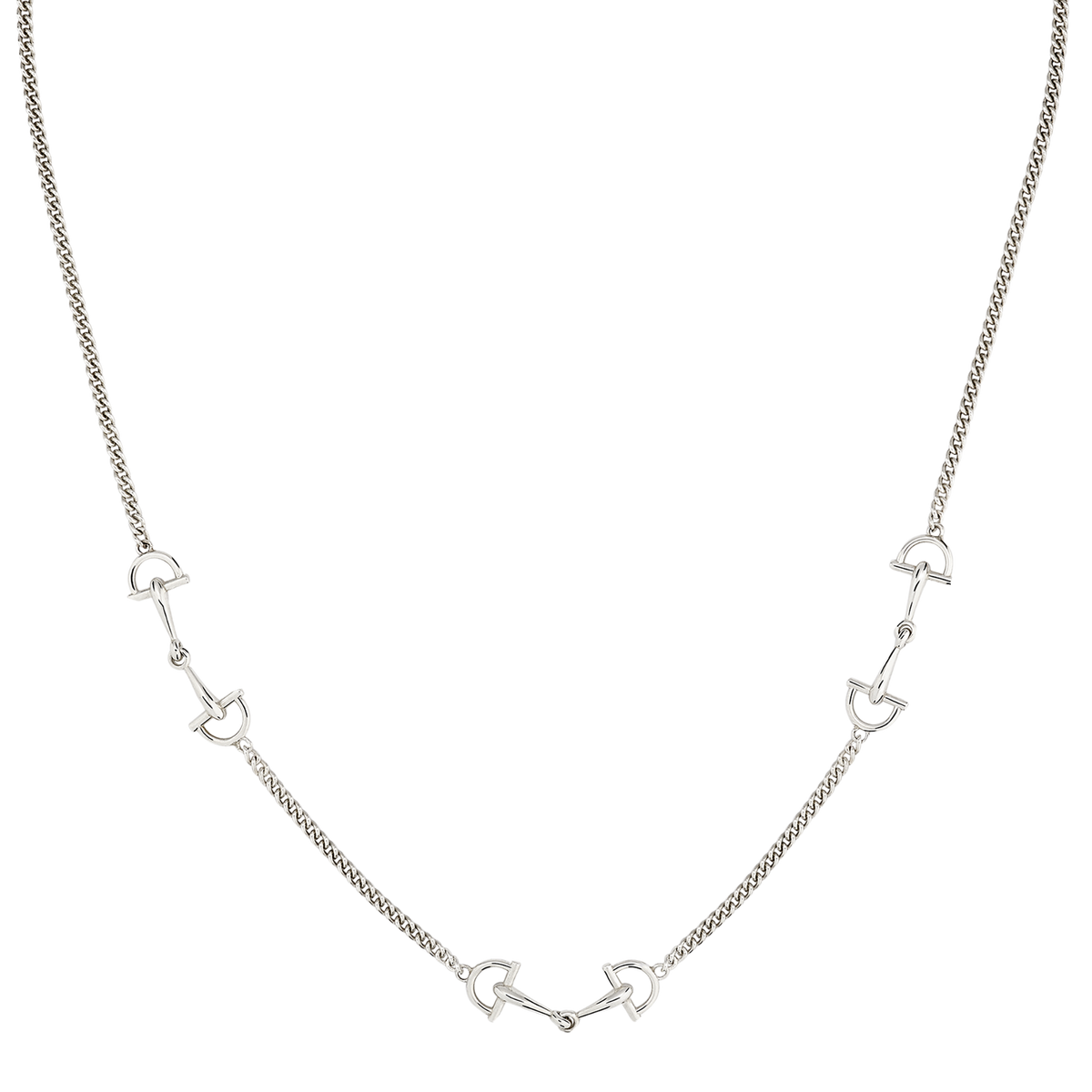 Close-up of the Gucci Staffa sterling silver necklace showcasing the polished stirrup-inspired motifs connected by a fine silver chain.
