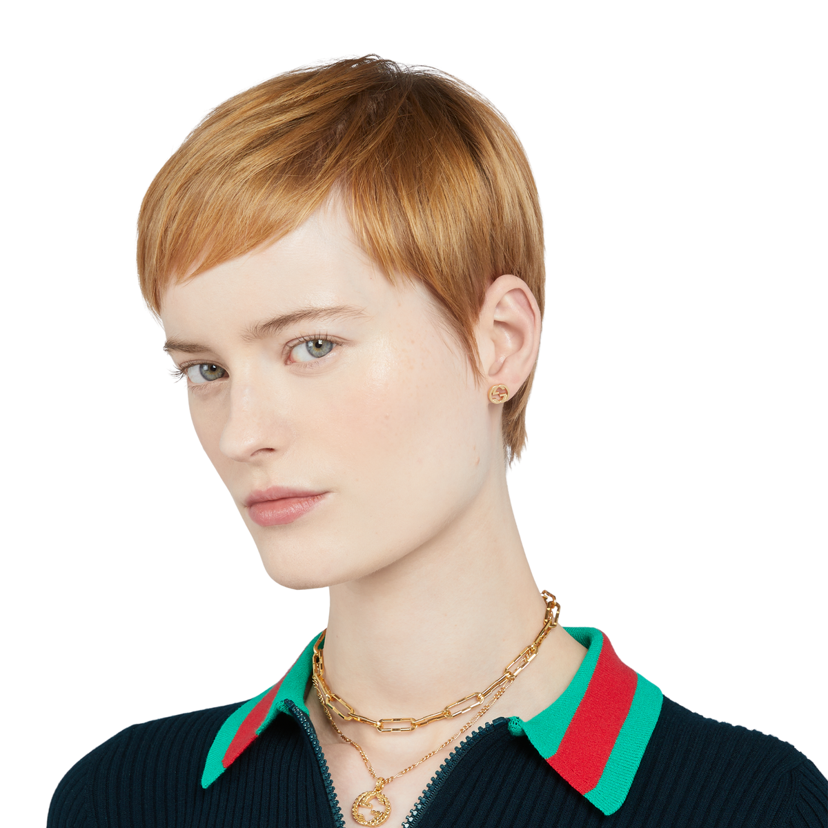 These Gucci stud earrings showcase the brand’s signature interlocking GG motif in radiant 18ct yellow gold. Designed with a polished finish and butterfly back fastening, they combine comfort with timeless style. Lightweight and versatile, they’re an elegant choice for daily wear or understated evening styling.