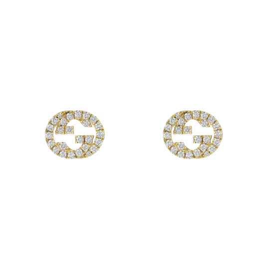Elegant, minimal, and unmistakably Gucci, these stud earrings feature the iconic Interlocking G motif crafted in 18ct yellow gold and accented with brilliant diamonds