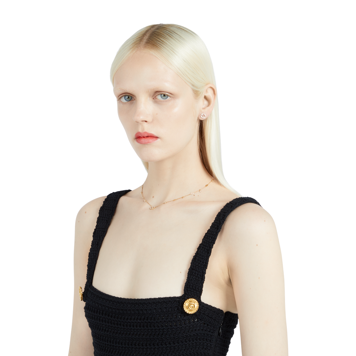 A refined expression of Gucci’s fine jewellery craftsmanship, these Interlocking G stud earrings are crafted from 18ct yellow gold and set with brilliant-cut diamonds. Featuring the iconic GG motif, they combine timeless elegance with subtle sparkle, making them a sophisticated choice for everyday luxury or special occasions.