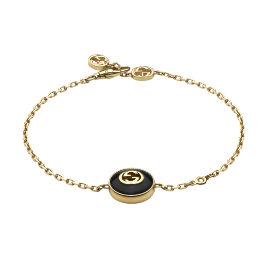 Gucci Interlocking G 18ct yellow gold bracelet with black onyx and diamond detail