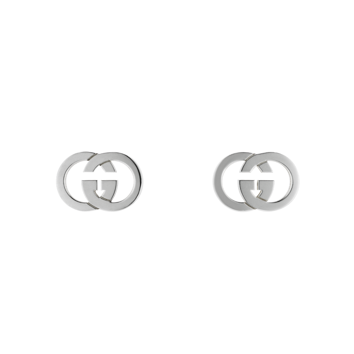 Sleek and effortlessly modern, these Gucci Interlocking GG stud earrings feature the iconic cut-out logo in polished sterling silver.