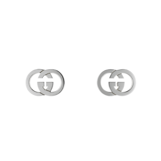 Sleek and effortlessly modern, these Gucci Interlocking GG stud earrings feature the iconic cut-out logo in polished sterling silver.