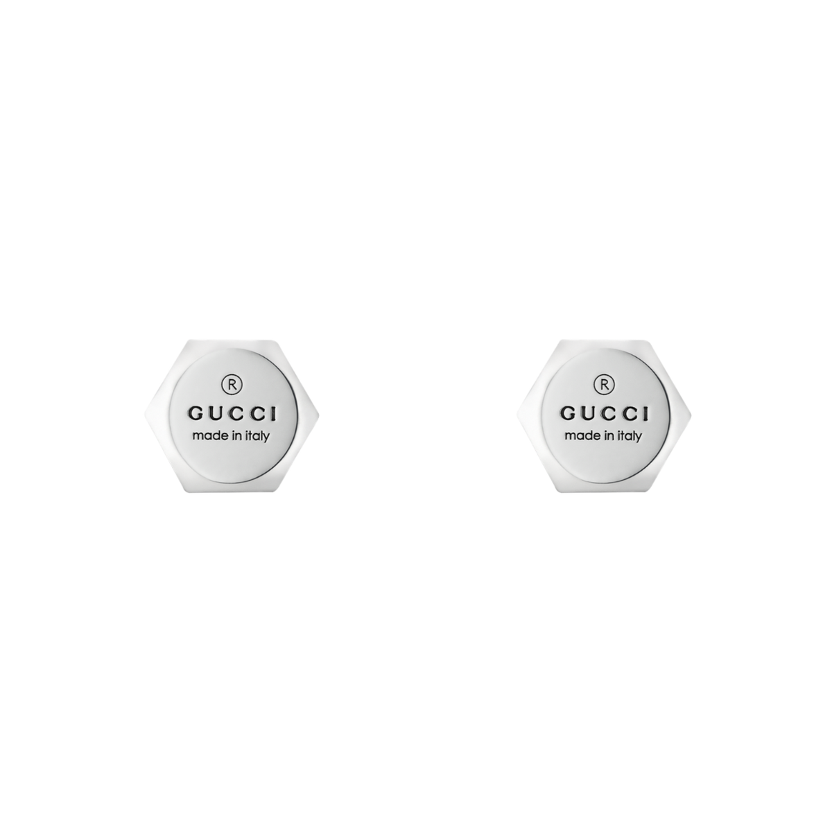 The Trademark heart stud earrings are crafted from polished sterling silver and engraved with the iconic Gucci logo. 