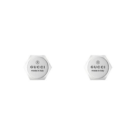 The Trademark heart stud earrings are crafted from polished sterling silver and engraved with the iconic Gucci logo. 