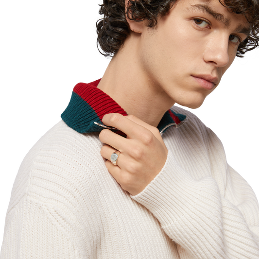 Gucci sterling silver signet ring featuring a polished hexagonal design and trademark engraving