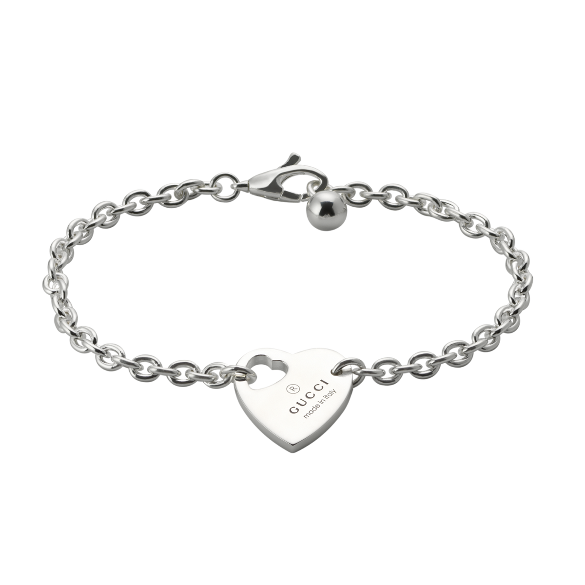 A romantic expression of Gucci’s signature design language, this Trademark heart motif bracelet is crafted from polished sterling silver and features an engraved heart charm with the iconic Gucci logo.