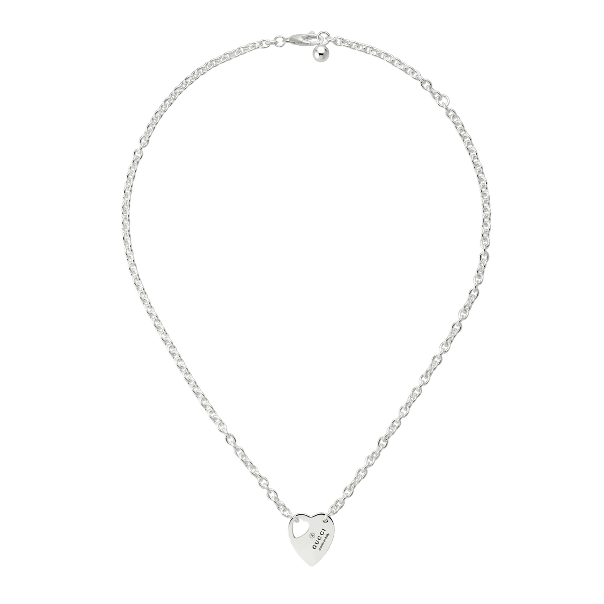 A romantic expression of Gucci’s signature jewellery aesthetic, this Trademark heart motif necklace is crafted from polished sterling silver and finished with an engraved heart pendant featuring the iconic Gucci logo. The delicate chain and refined silhouette make it a timeless everyday accessory with subtle luxury appeal.