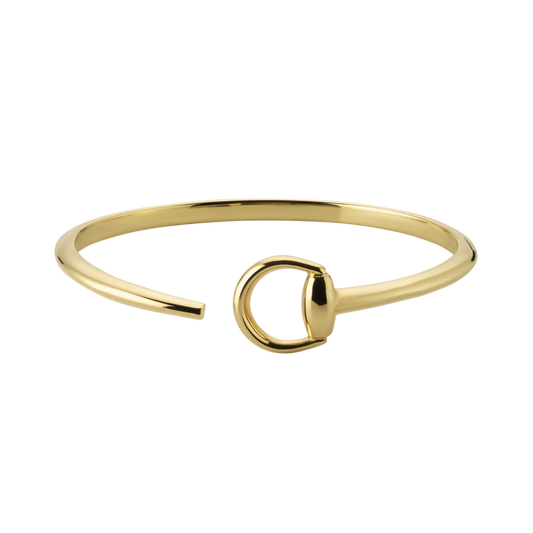 A timeless expression of Gucci’s equestrian heritage, this Horsebit bangle is crafted from luxurious 18ct yellow gold and finished with the brand’s iconic half-horsebit motif. 