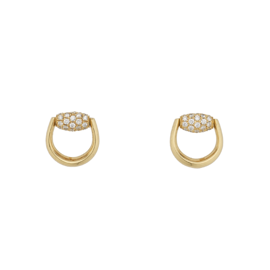 A refined expression of Gucci’s equestrian heritage, these Horsebit earrings are crafted from 18ct yellow gold and accented with delicate diamond detailing.