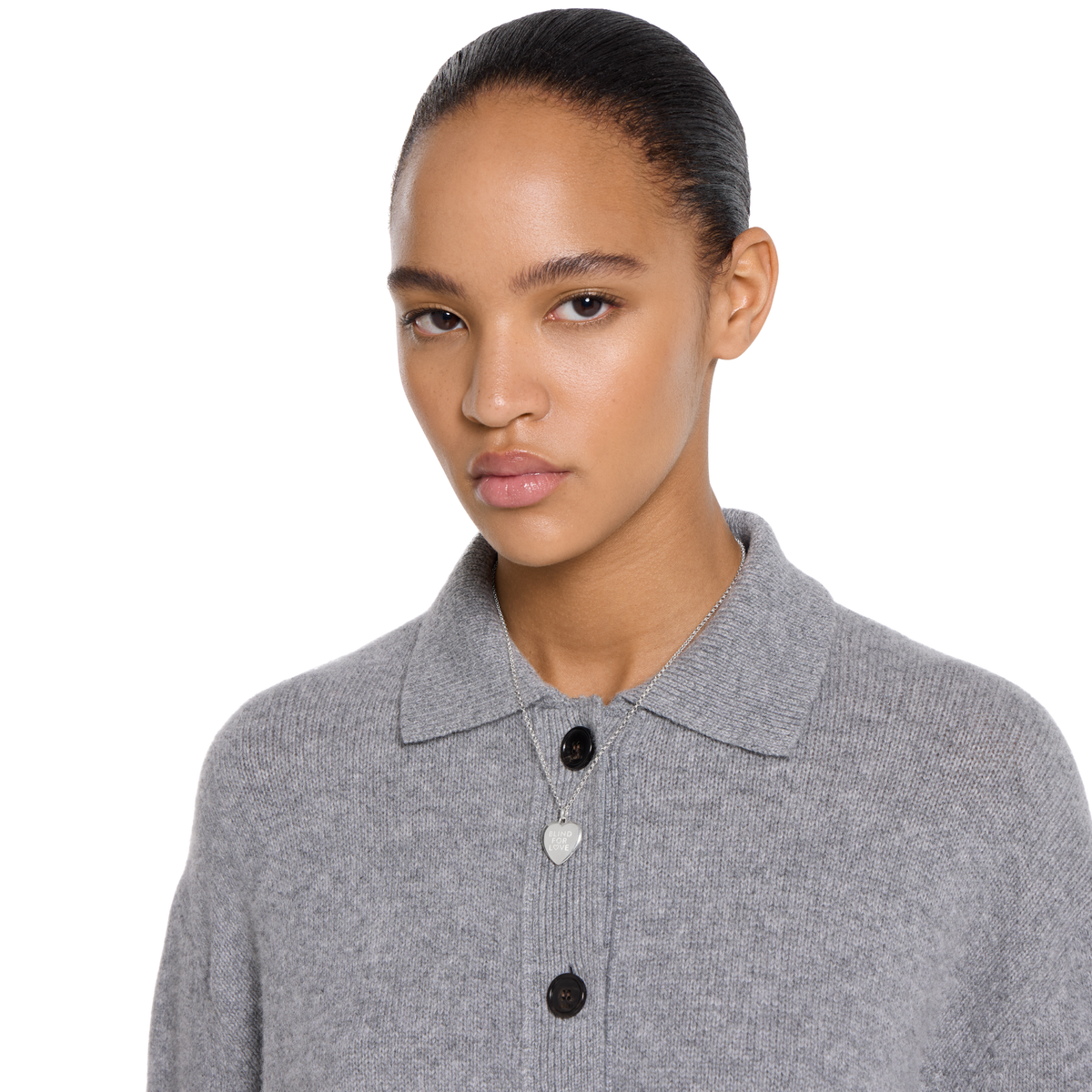 Minimalist sterling silver-style heart necklace with engraved detailing, offering a refined and versatile jewellery piece for daily wear or gifting.