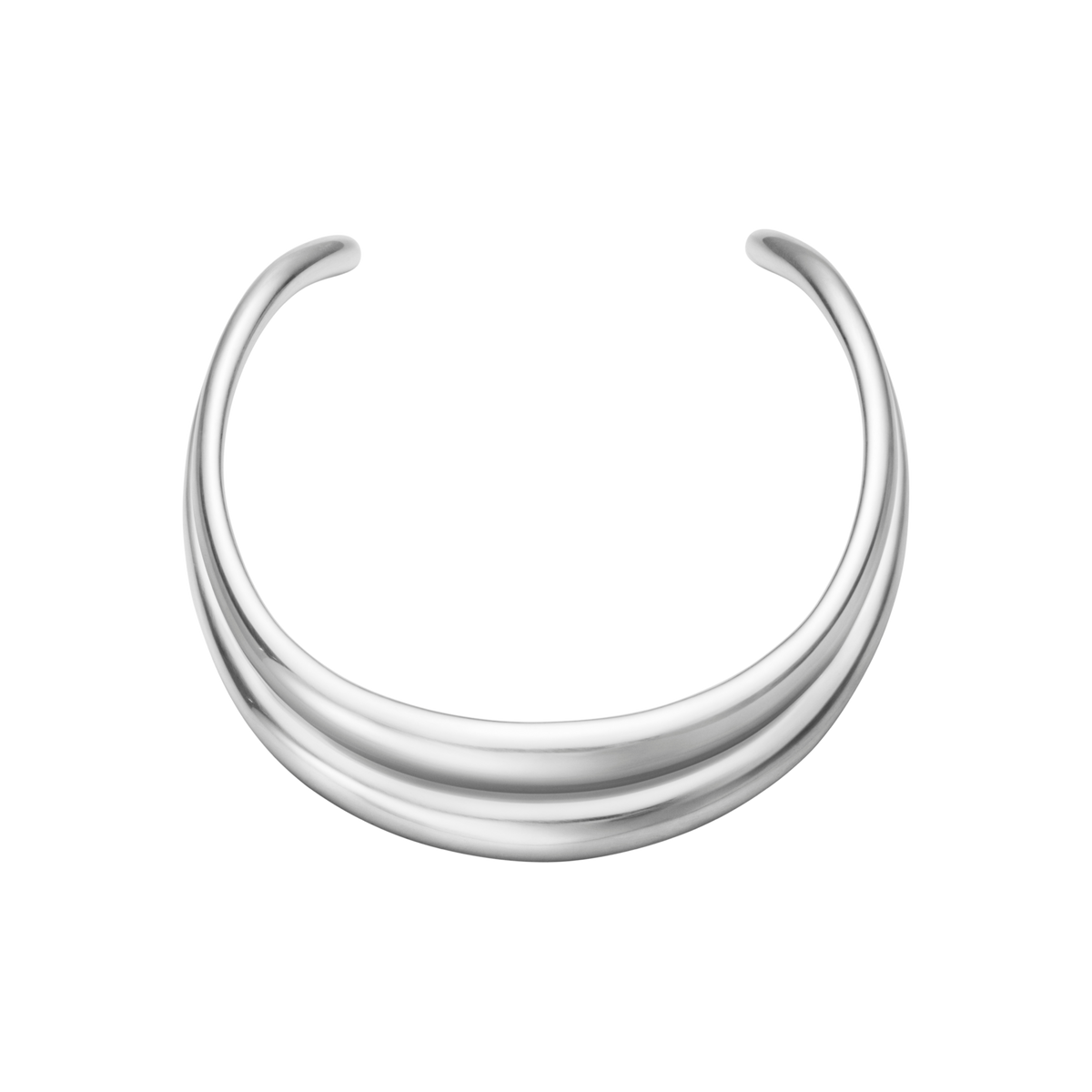 The Georg Jensen Curve Necklace in Sterling Silver is a striking example of modern Scandinavian design, featuring a fluid, sculptural pendant that flows effortlessly along elegant organic lines. Its minimalist aesthetic gives it a timeless quality that feels both contemporary and sophisticated.

