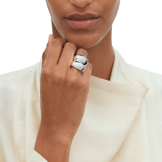 Combining artistic craftsmanship with timeless style, the Georg Jensen Curve Ring is a modern jewellery icon. Its elegant sculptural form celebrates movement, individuality, and contemporary luxury, creating a piece that is designed to be treasured for years to come.