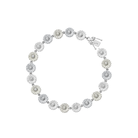 Georg Jensen Daisy sterling silver bracelet with white enamel flower detailing and polished silver finish