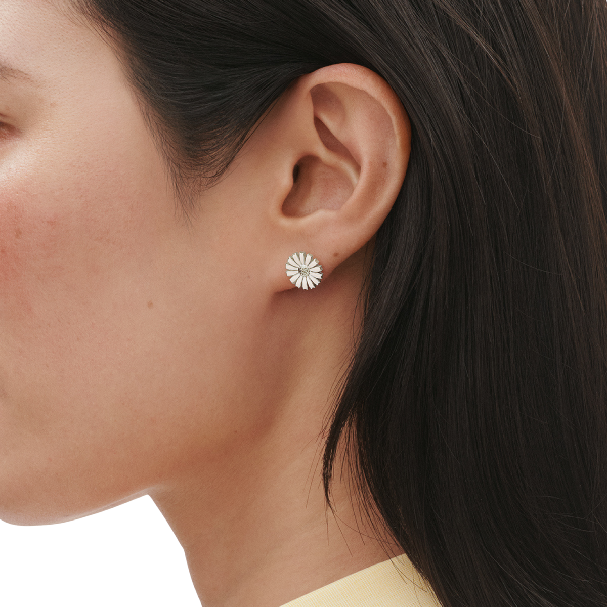 Lightweight and comfortable to wear throughout the day, the Daisy Stud Earrings sit neatly on the ear, adding a subtle touch of sophistication. Their versatile design makes them perfect for pairing with matching Daisy jewellery or wearing as a standalone statement.