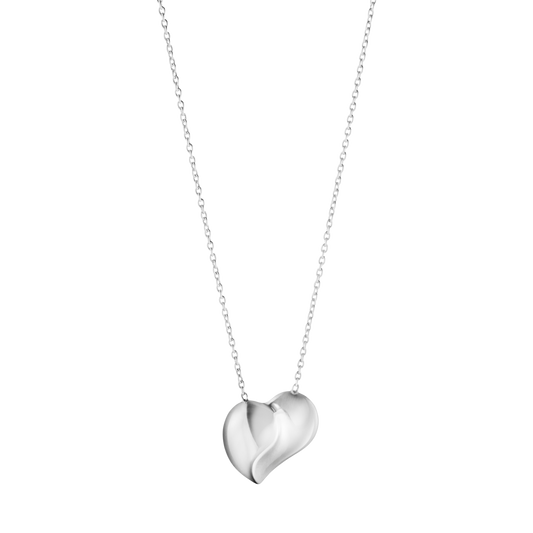 The Georg Jensen Heart Pendant is a beautiful expression of love and connection, crafted in polished sterling silver with the flowing, sculptural lines that have become a signature of the brand. 