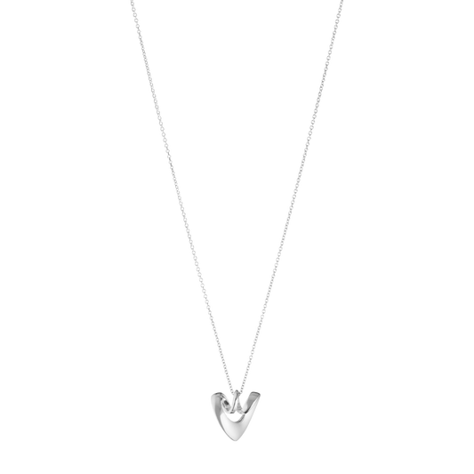 The Georg Jensen Heart Silver Pendant is a timeless symbol of love, beautifully crafted in sterling silver with the soft, flowing curves that define Scandinavian design.