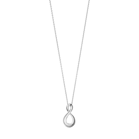 Suspended from a fine sterling silver chain, the Georg 
Jensen Infinity pendant sits beautifully at the neckline, making it an effortless piece for everyday wear. Whether worn alone as a subtle statement or layered with other favourites, its versatile design complements both casual and formal styling.