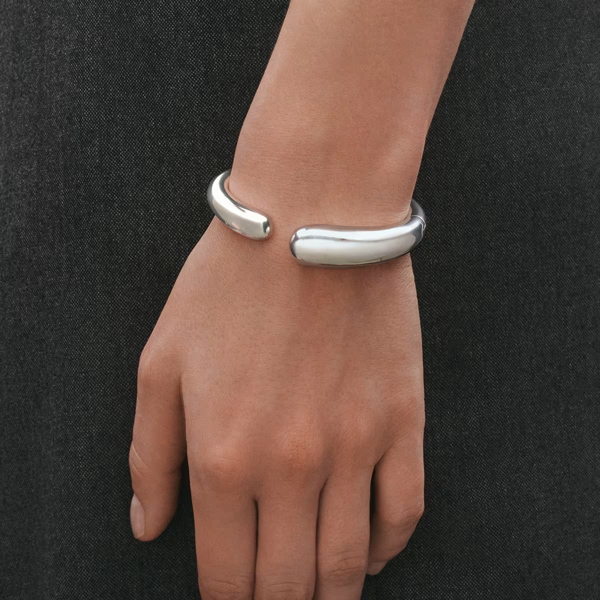 Designed by acclaimed jewellery designer Jacqueline Rabun, the Mercy collection celebrates the experiences, connections, and moments that shape our lives. The bangle’s organic form creates a beautiful sense of movement, making it a meaningful piece as well as a stunning design statement.