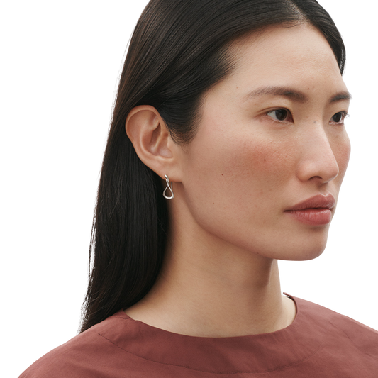 Lightweight and comfortable to wear throughout the day, these small hoop earrings are perfect for those who love understated jewellery with a little more character. Their versatile size makes them easy to style with everything from casual knitwear to tailored evening looks.