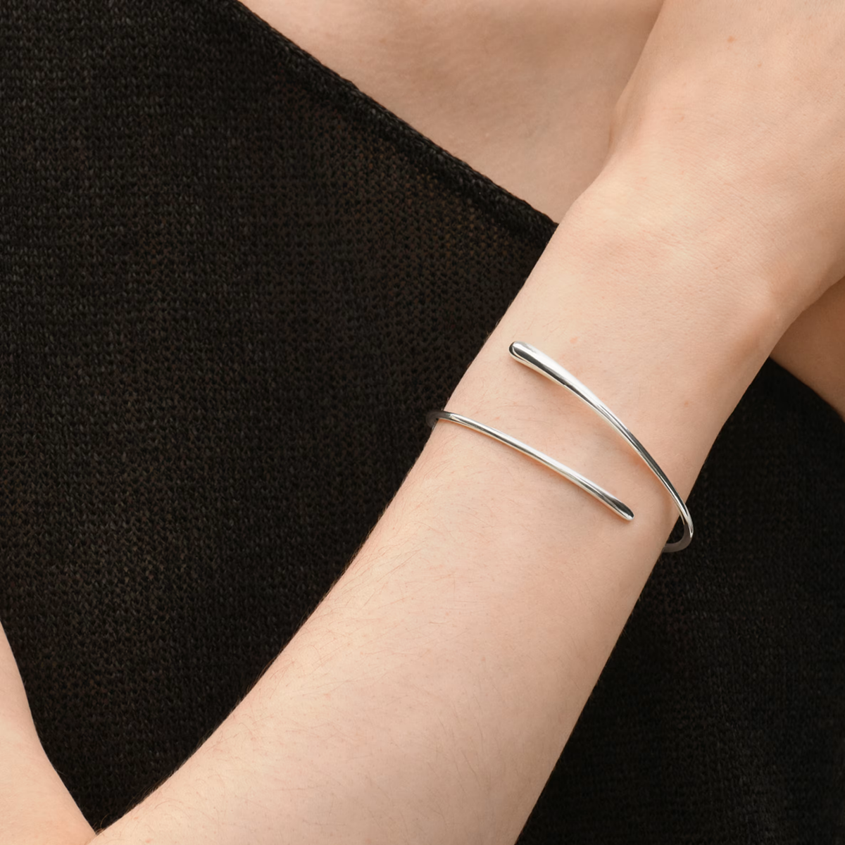 Georg Jensen Mercy Sterling Silver Bangle close-up on a model 