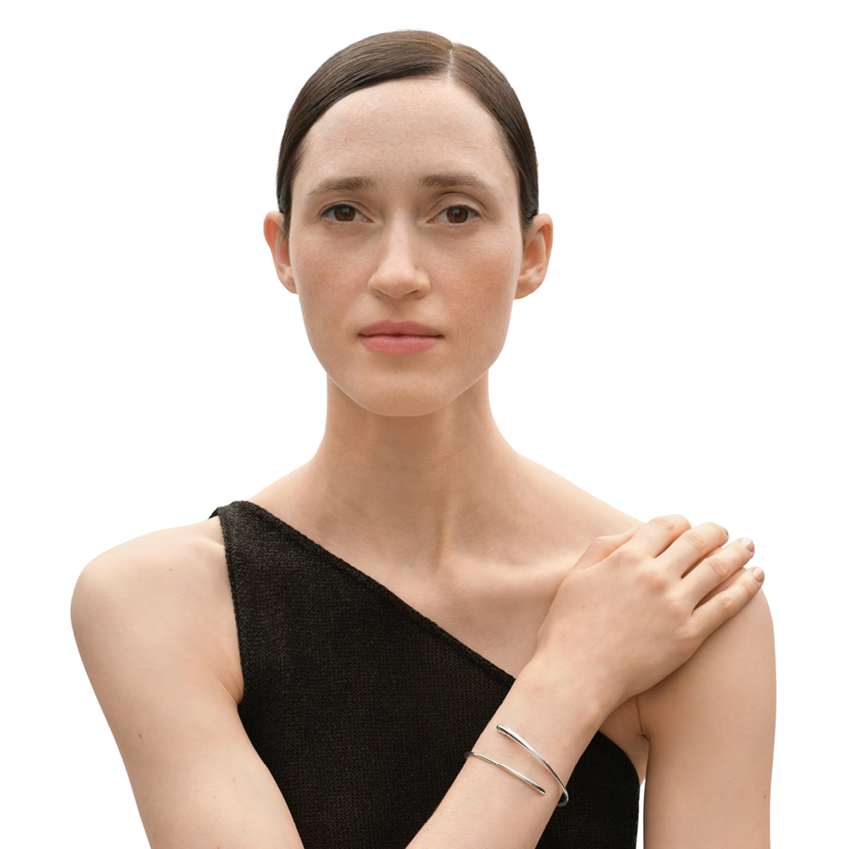 Georg Jensen Mercy Sterling Silver Bangle on a model in a black dress 