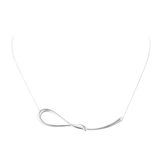 The Georg Jensen Mercy Pendant has a distinctive, sculptural shape that immediately catches the eye. Crafted in sterling silver, it is an easy piece to wear whether you're dressing up or keeping things simple.