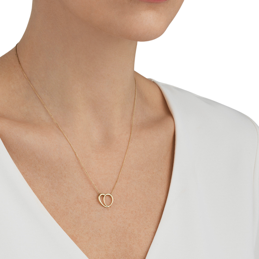 Warm, understated and beautifully crafted, this pendant has a timeless quality that never feels overdone. The polished gold catches the light with every movement, while the delicate heart shape adds just the right amount of detail, making it a necklace you'll reach for every day.