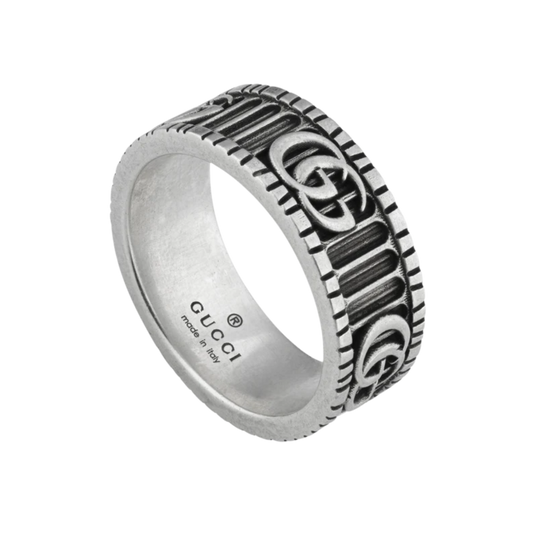 Crafted from sterling silver, this Gucci GG Marmont ring showcases the iconic Double G motif, offering a timeless designer look that's perfect for everyday wear or special occasions.