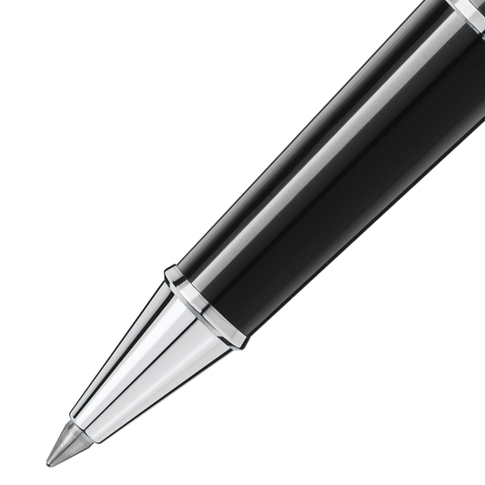 Close-up of the Montblanc Meisterstück rollerball pen tip with polished platinum-coated cone and black resin barrel.