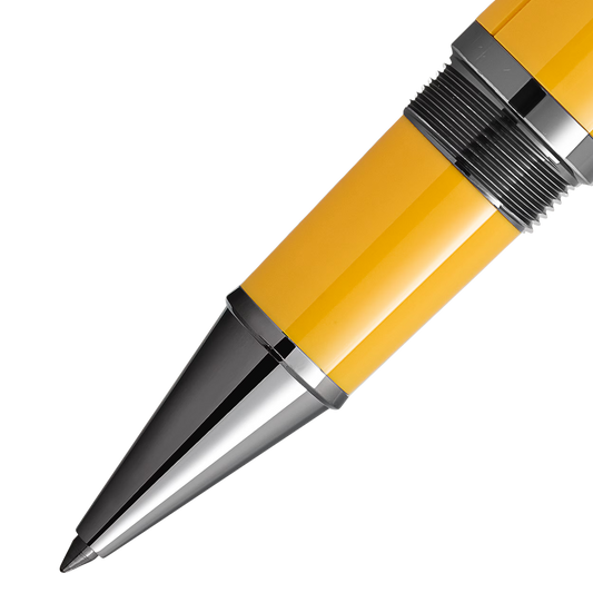 Close-up of the Montblanc Great Characters Enzo Ferrari Giallo Modena rollerball pen tip and yellow resin barrel.