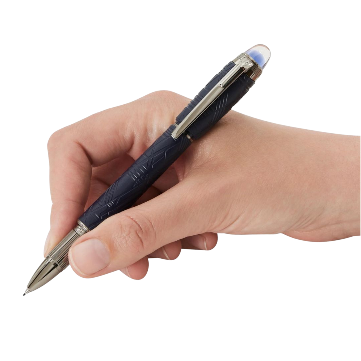 Hand holding the Montblanc StarWalker SpaceBlue Precious Resin fineliner pen with dark ruthenium-coated trim.