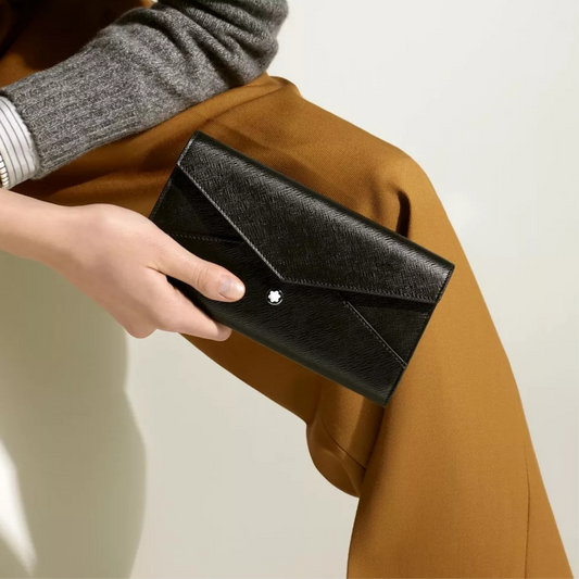 A person holding Montblanc Sartorial Wallet 6CC Black Leather
