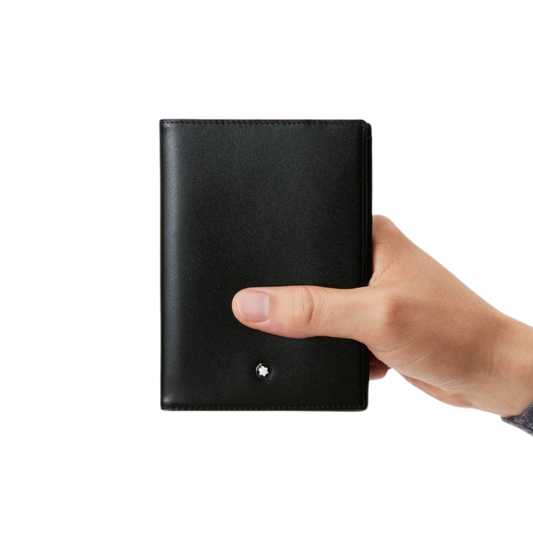 A person holding Montblanc Meisterstück Passport Holder Black Leather