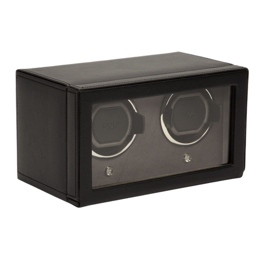 WOLF Double Cub Watch Winder in black vegan leather, featuring dual winding modules and a protective cover designed to keep automatic watches running accurately between wears.