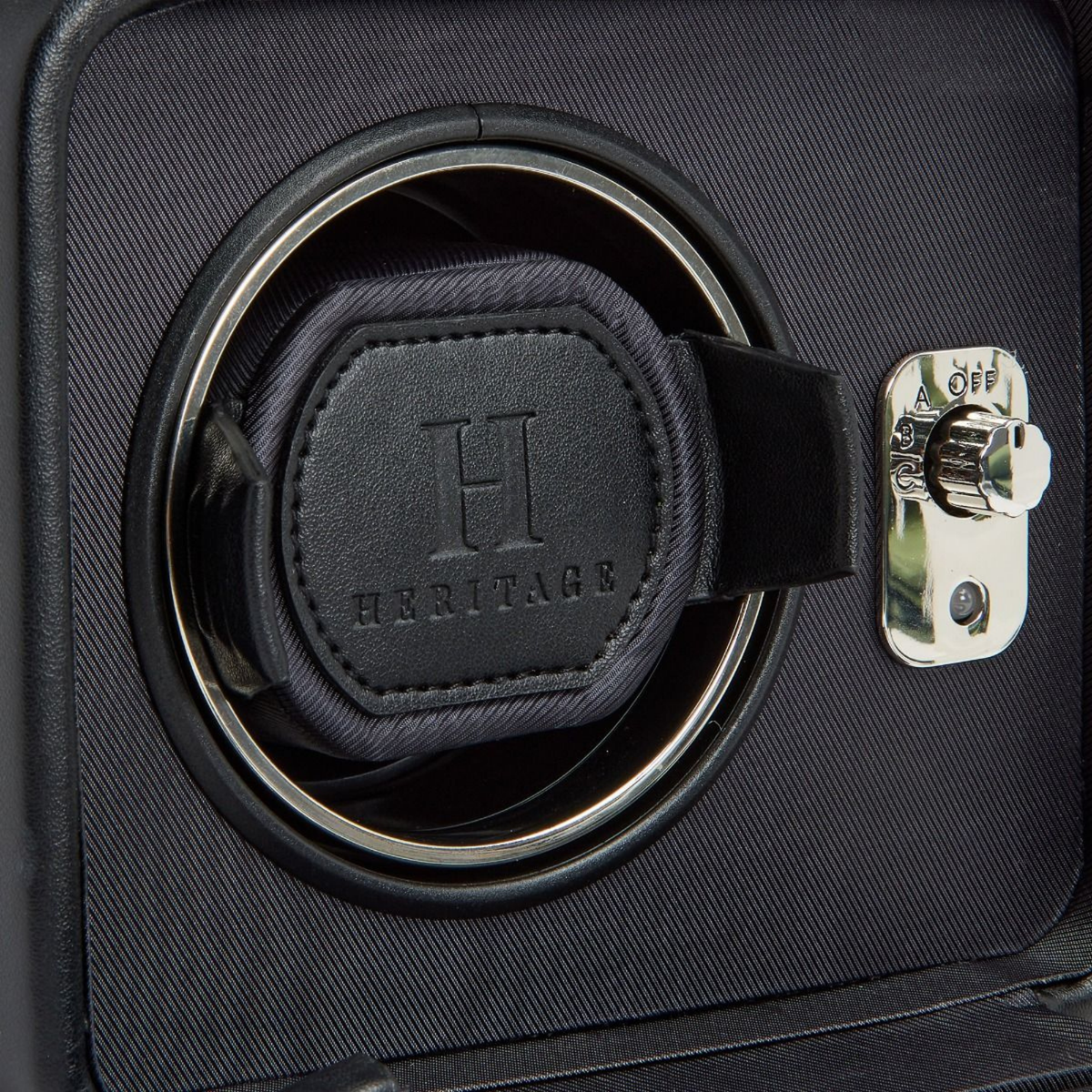 Luxury single watch winder from WOLF 1834 with chrome accents and a black exterior, designed to keep automatic timepieces wound, protected and ready to wear.